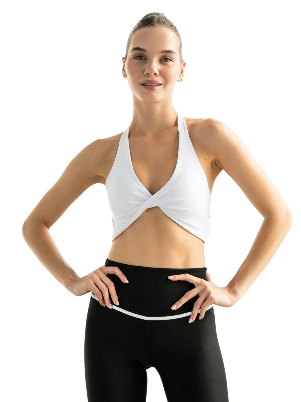 Frau in einem Lismina 392 Saintes Sport-BH mit schwarzen Leggings, die Fitness und Vitalität ausstrahlt.